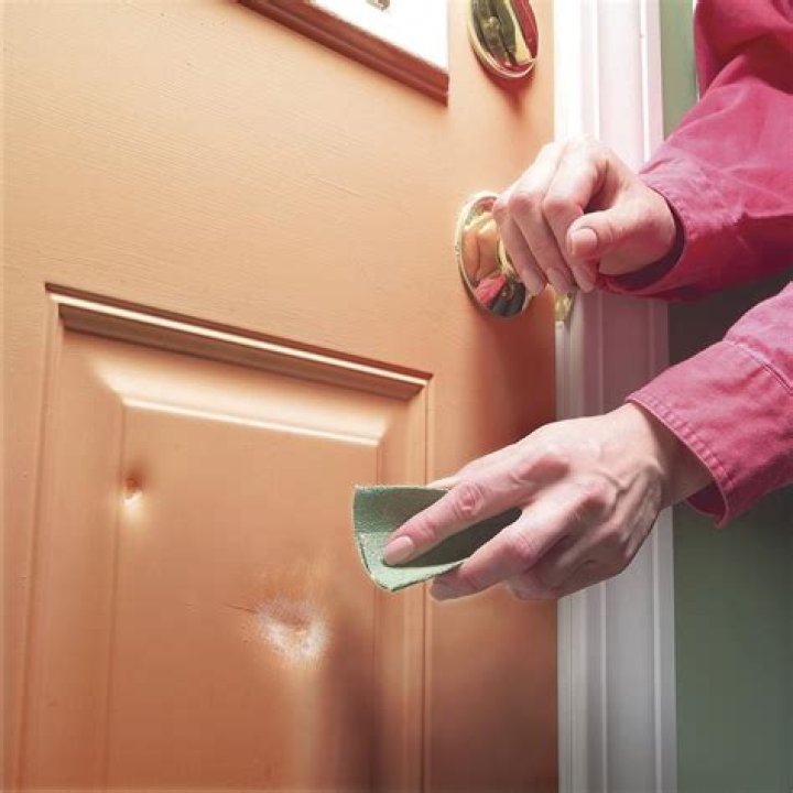 How do I fix a dent in my front door?
