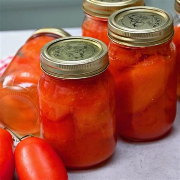 How long do I boil tomatoes for canning?